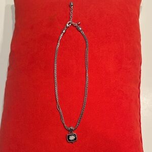 Elegant Silver Necklace with Black Pendant